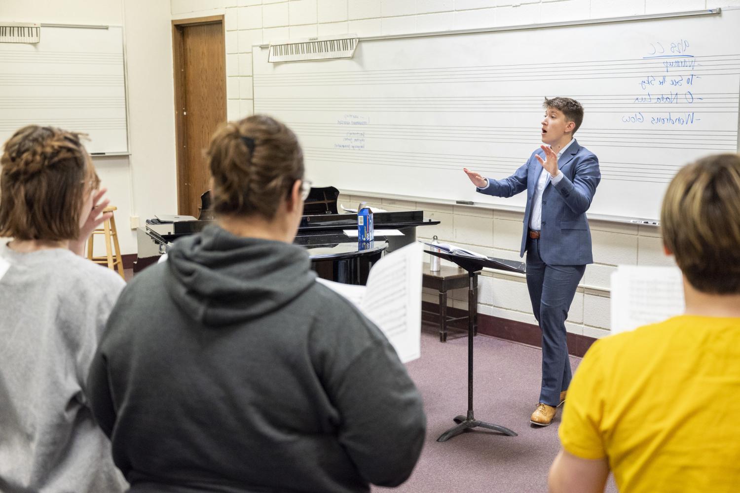 Professor Maggie Burk (music) and the Carthage Choir.